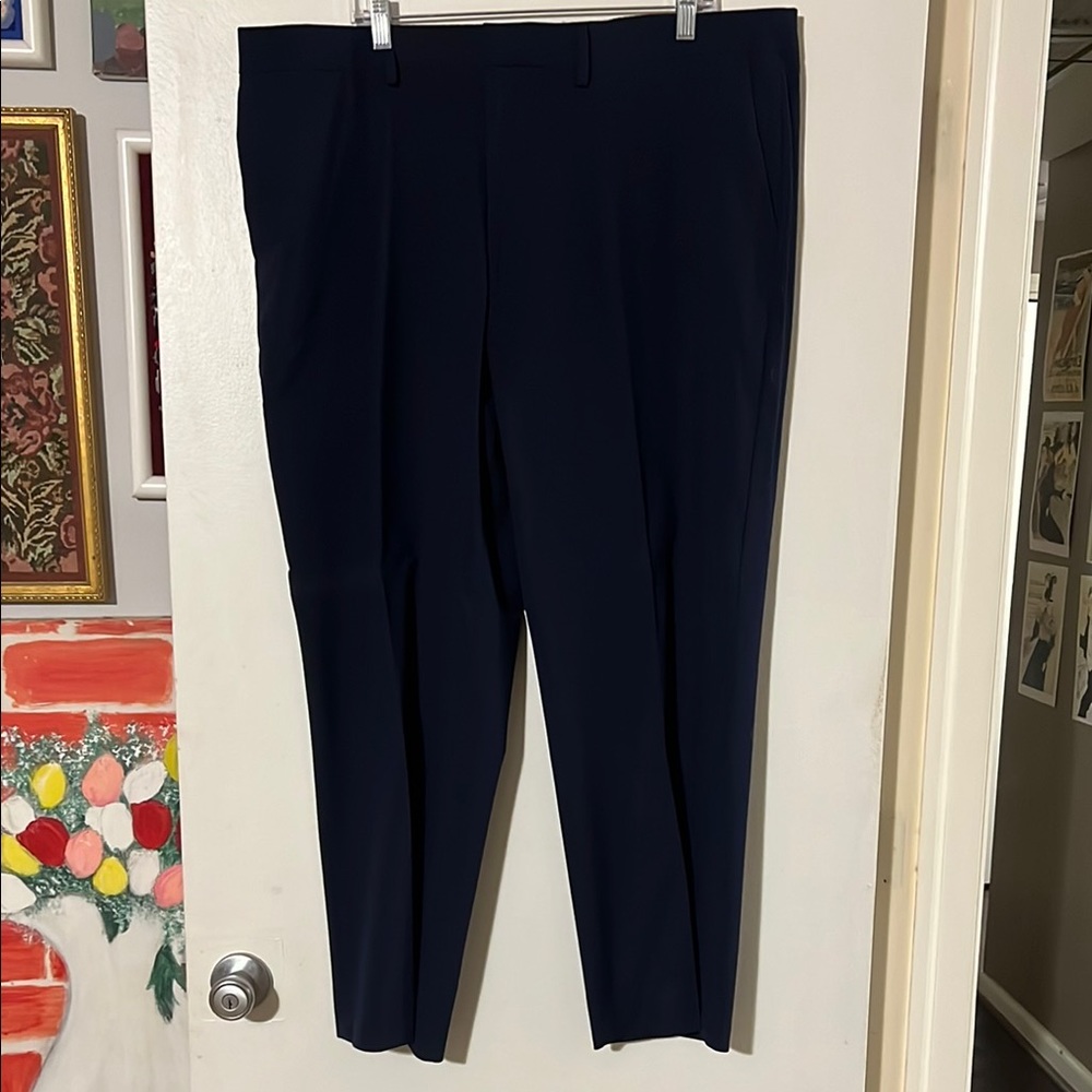 J.M. Haggar navy men’s trousers. Classic fit.